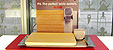 Counter screen display for playing promotional videos and cardboard graphic communications